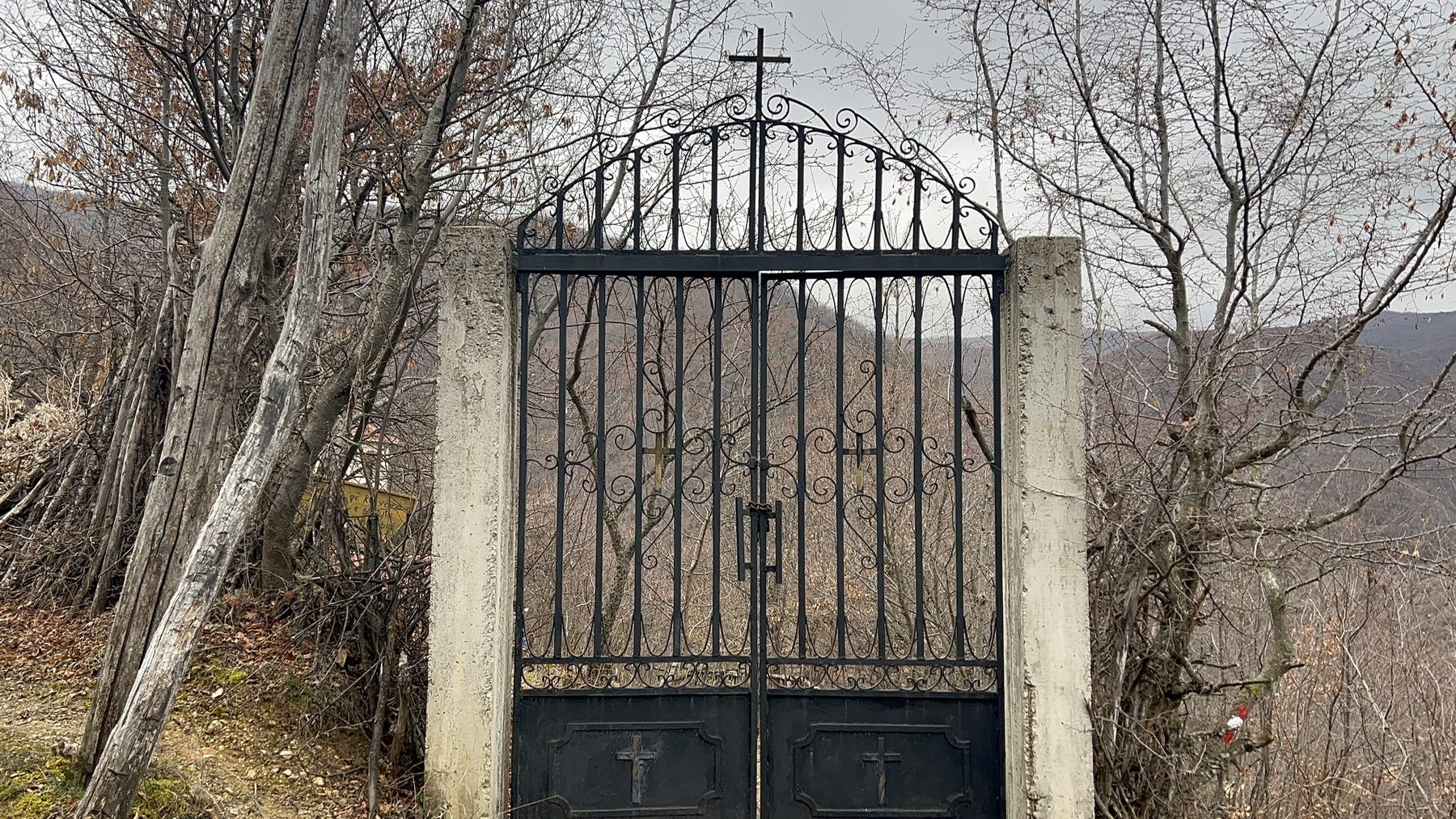 The gate into the grounds of Kisha Shën e Diela church on the Kabash Trail